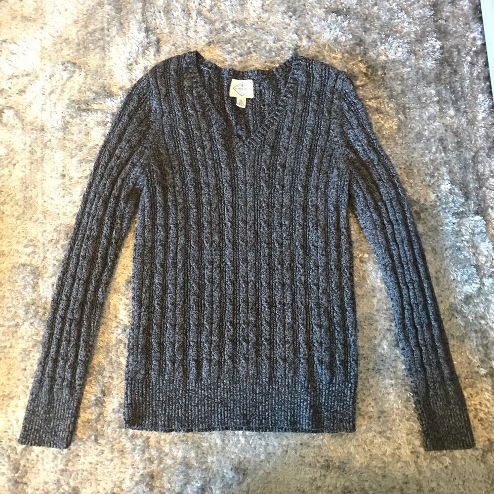 Grey knit sweater.